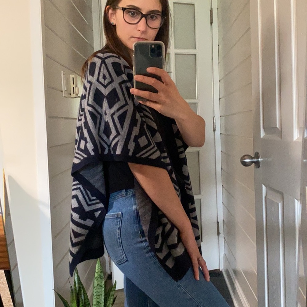 Patterned grey and navy blue poncho sweater